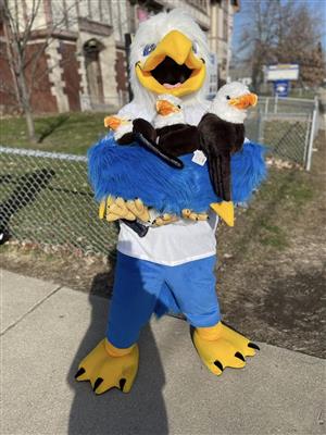 eagle mascot holding stuffed animal eagles